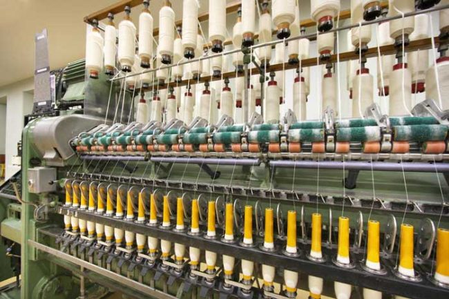 Improving yarn imperfections by optimisation of roller space settings in ring frame